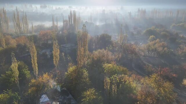 Vibrant aerial view of Hunza Valley, during autumn. Among the rocky mountains. Pakistan