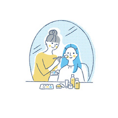 女性に化粧をするメイクアップアーティスト