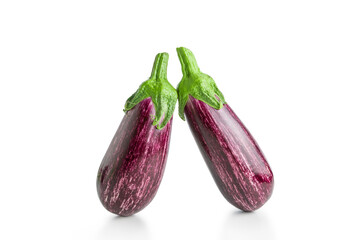 Two ripe graffiti eggplants isolated on a white background. Food concept.