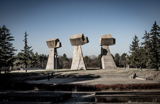 Yugoslavian Spomenik in Nis. Bubanj hill. South Serbia. Fists child, woman, man