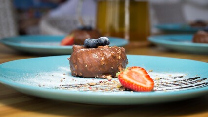 Marshmallow dessert with fruits on a plate