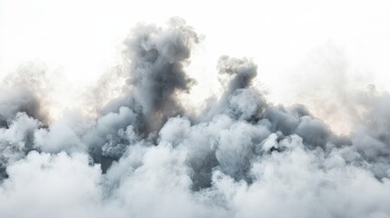 Obraz premium Billowing gray and white smoke creates an abstract atmospheric effect. Ideal for backgrounds overlays or visual effects.