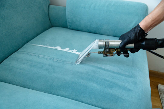 Professional sofa cleaning using modern equipment. Deep stain removal and fabric care for upholstery. Home cleaning services, hygiene promotions, and furniture care advertisements.