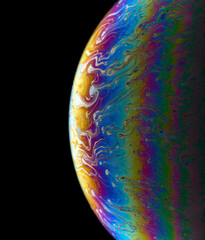 Space abstraction: bright color overflows in the style of soap bubbles. The play of light and textures creates the effect of a planet in the universe. Ideal for concepts of art and futurism.