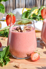 refreshing fresh milkshake with fresh and natural ingredients. on a sunny terrace, summery atmosphere