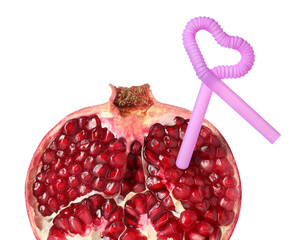 Ripe pomegranate with drinking straw on white background. Organic juice or freshly made smoothie...