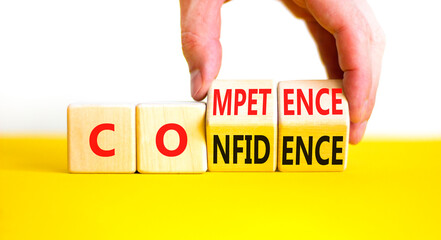 Competence and confidence symbol. Concept word Competence Confidence on wooden cubes. Businessman...