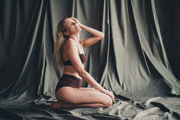Obraz premium Full length no filter studio photo of pretty seductive woman wear lingerie enjoying self acceptance isolated khaki cloth background