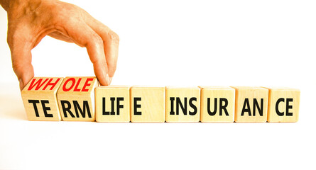 Term or whole life insurance symbol. Concept words Term life insurance or Whole life insurance on wooden blocks. Beautiful white background. Business term or whole life insurance concept. Copy space.