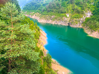 Valvestino lake from Recchi bridge. Colorful summer scene of Val di Vesta Natural Park, Italy,...
