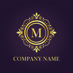 Letter M luxury gold logo concept