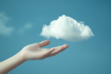 Hand outstretched, holding small, fluffy cloud, blue sky.