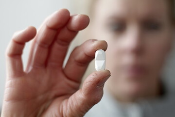 healthcare woman with tablet pill in hand stock photo stock image