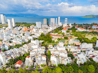 The urban landscape.

Nha Trang is a resort city in Vietnam. It's a sunny day. Shooting from a drone. 