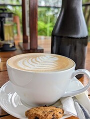 cup of coffee and cookies