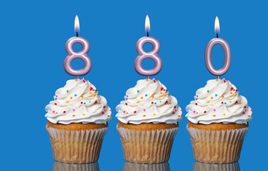 Birthday Cupcakes With Candles Lit Forming The Number 880