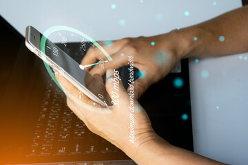 fast internet connection speedtest network bandwidth technology Man using high speed internet with smartphone and laptop computer. 5G quality, speed optimization.