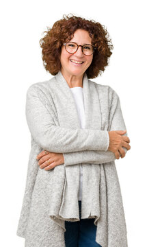 Beautiful middle ager senior woman wearing jacket and glasses over isolated background happy face smiling with crossed arms looking at the camera. Positive person.