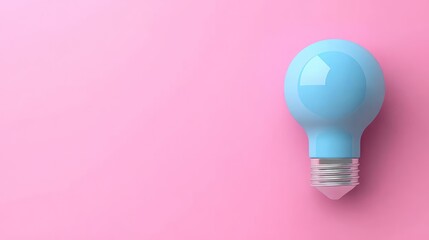 Fototapeta premium A blue light bulb rests on a soft pink surface, adding a playful touch to any space with its design