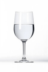 Obraz premium A clear wine glass filled with pure water isolated on white background