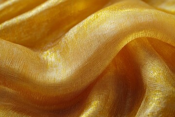 Golden fabric texture forming elegant waves, creating a luxurious background for various design purposes
