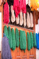 Fes, Morocco. Skeins of yarn hang to dry after being hand dyed