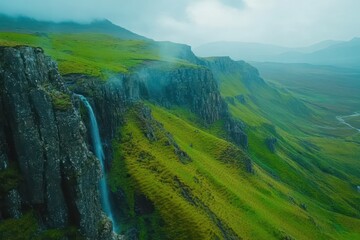 Majestic waterfall cascades down rugged cliffs in the Scottish Highlands, surrounded by lush greenery and misty peaks at dawn