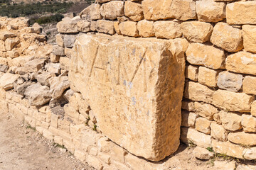 Dougga, Beja, Tunisia. An inscribed stone at the Roman ruins.