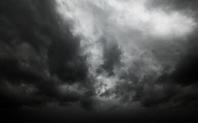 Fototapeta premium dark dramatic sky with black stormy clouds before rain as abstract background, extreme weather
