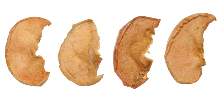Dried apple slices on isolated background, top view
