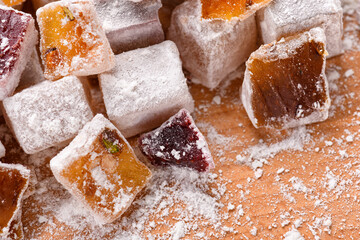 Sweet food Turkish delight, assorted rahat locum in form of cubes with nuts and powdered sugar, traditional food