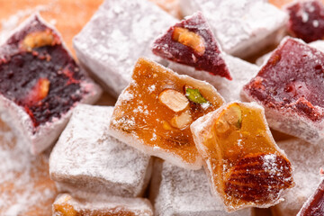 Sweet food Turkish delight, assorted rahat locum in form of cubes with nuts and powdered sugar, traditional food