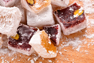 Sweet food Turkish delight, assorted rahat locum in form of cubes with nuts and powdered sugar, traditional food
