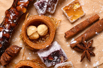 Sweet food Turkish delight on wooden background, assorted locum and candy as decorated backdrop