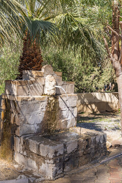 Zaghouan, Tunisia. Water flowing from a fountain at the ruins of the Roman Water Temple.