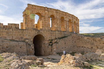 Fototapeta premium Ben Arous, Tunisia. Ruins of the Roman Amphitheater at the Uthina Archaeological Site.