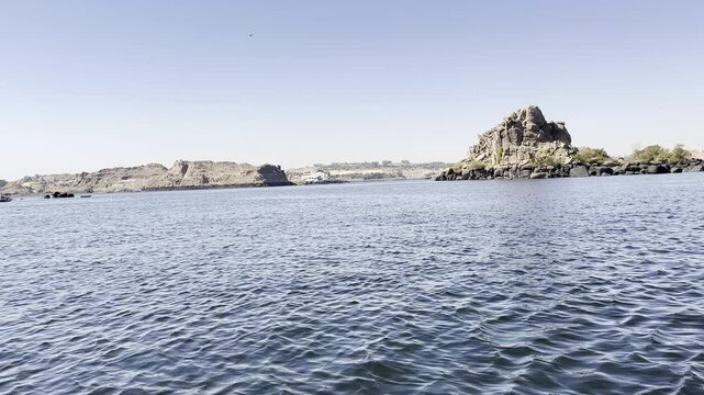 Tourist boats from Aswan to Philae, with excursion on the Nile River (Egypt). This popular tourist activity offers a unique way to reach the temple of Isis.