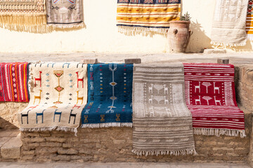 Kairouan, Tunisia. Traditional woven rugs for sale at a market in Kairouan.