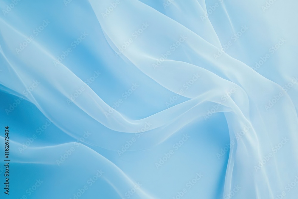 Poster elegant sheer fabric drapes in soft blue tones create a calming backdrop for creative projects