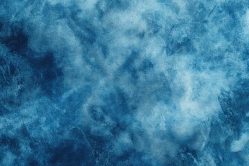 Fototapeta premium Blue textured surface resembling ocean water with soft waves and patterns illuminated by natural light