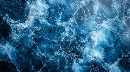 Obraz premium Turbulent ocean water with whitecaps and foam.