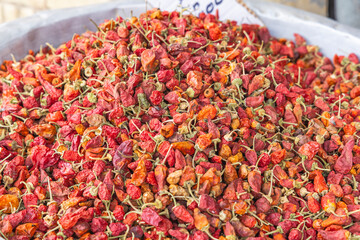 Sidi Bouzid, Tunisia. Dried red peppers for sale at the outdoor souk in Bir al Haffay.