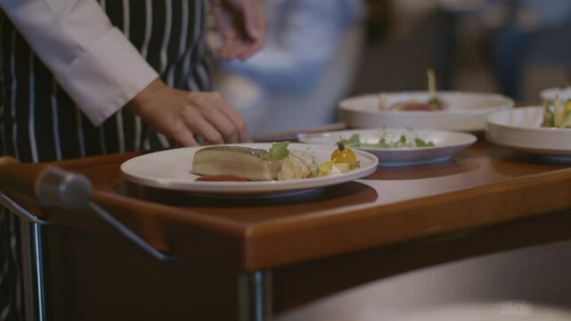 Close-up, Japanese cuisine with moving camera. Asian cuisine seafood, fish on a plate and served on the dining table. High quality detail shots