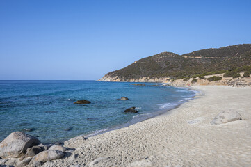 The beautiful beach of Porto Sa Ruxi in Sardinia with white sand and transparent blue and turquoise...