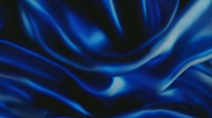Obraz premium Smooth blue silk fabric flowing and forming elegant waves