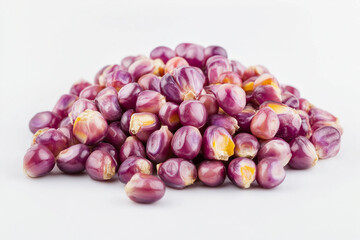 Purple corn kernels on white table, front facing © amavcoffee