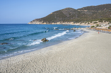 The beautiful beach of Porto Sa Ruxi in Sardinia with white sand and transparent blue and turquoise water