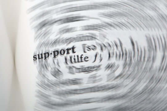 Support lettering with blurry Background