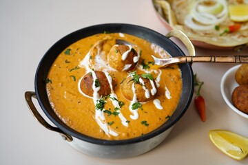 Malai Kofta served with Paratha |Indian vegetarian curry with deep fried potato paneer balls