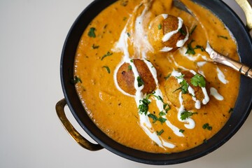 Malai Kofta served with Paratha |Indian vegetarian curry with deep fried potato paneer balls